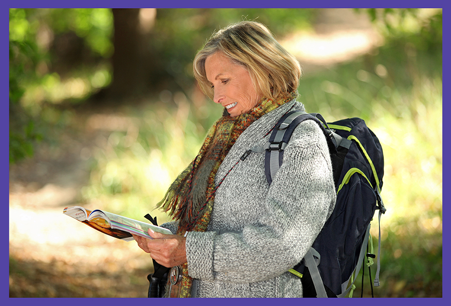 Personal Empowerment - woman walking in nature using her map to guide her