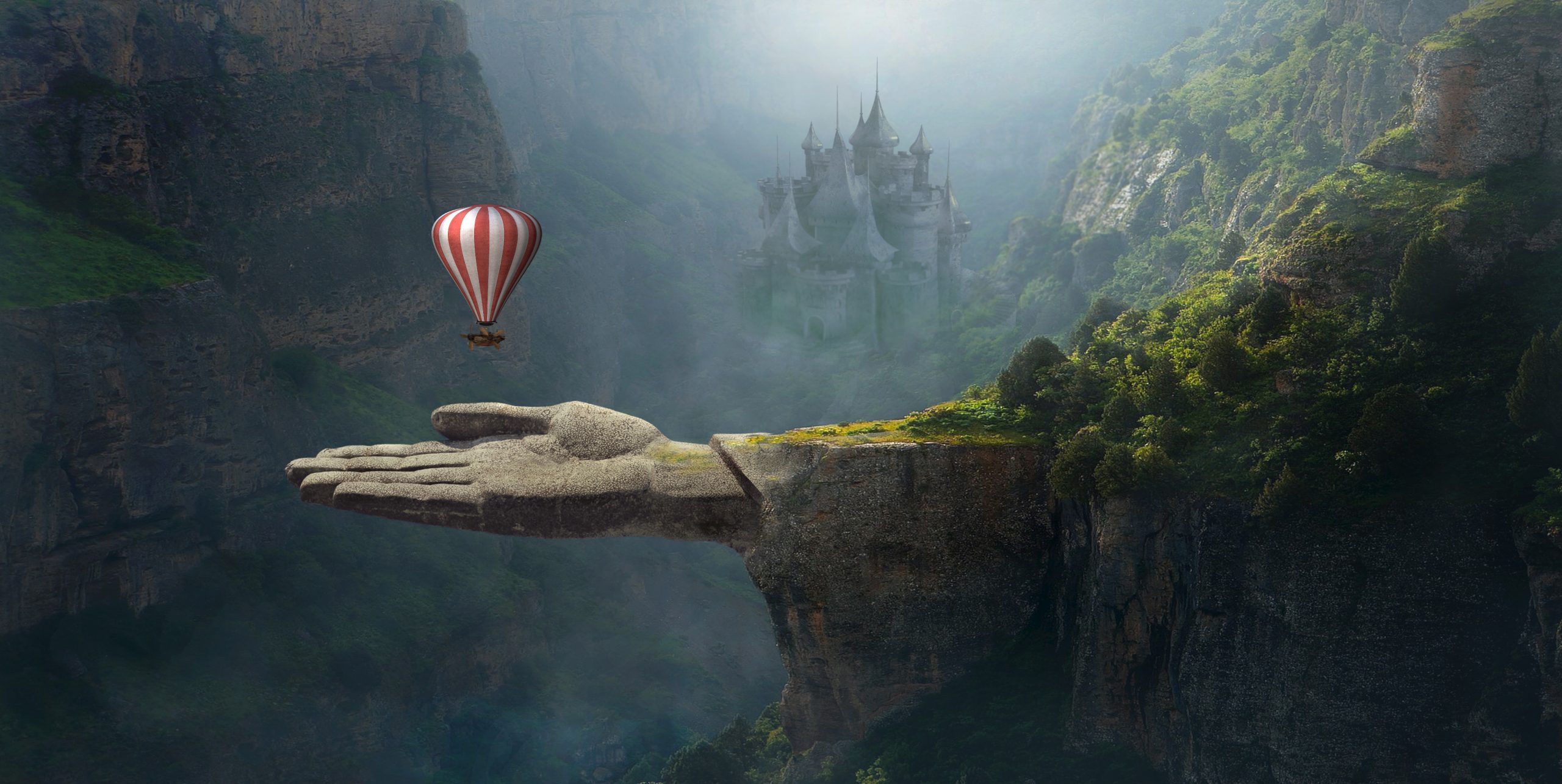 Anne Bolender Header fantasy hot ait balloon floating over a giant stone hand