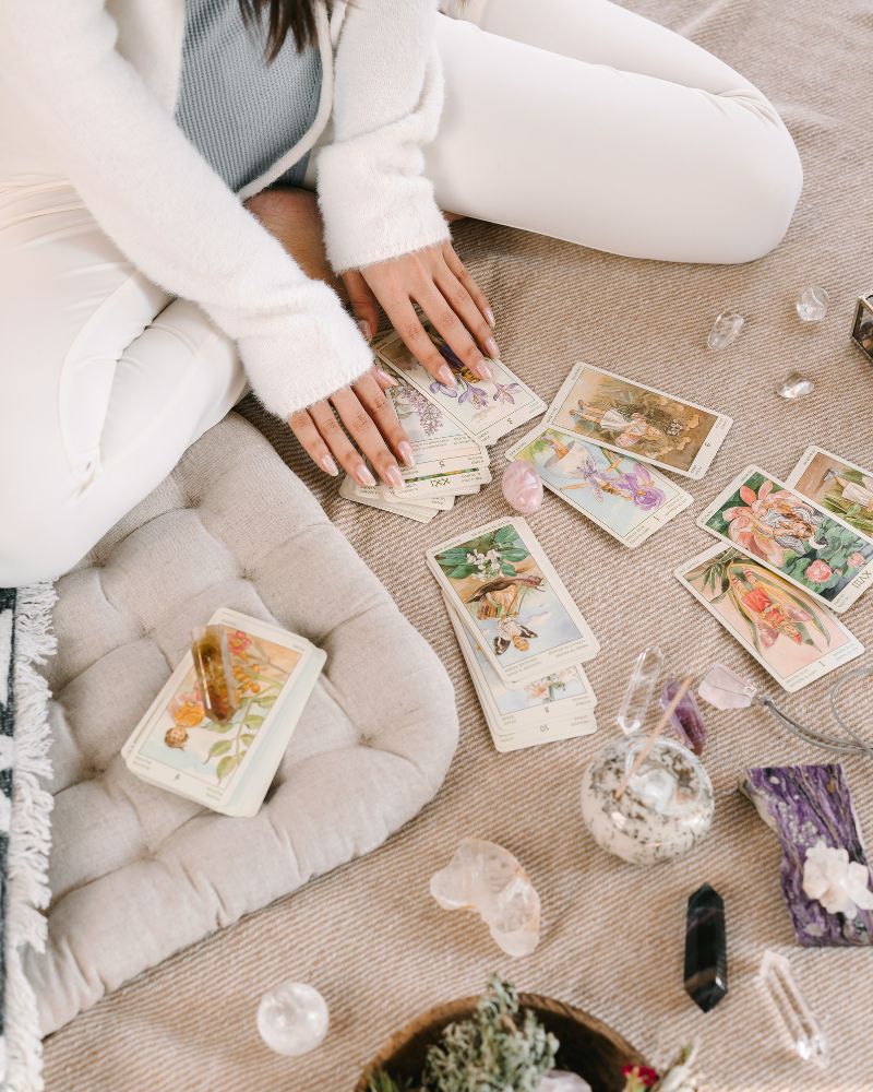 Person reading tarot cards