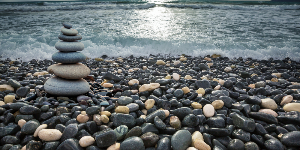 a stack of pebbles on a pebbly beach